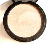 Illuminating Pressed Powder